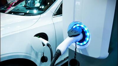 Power supply connect to electric vehicle for charge to the battery. Charging technology industry transport which are the futuristic of the Automobile. EV fuel Plug in hybrid car. (Shutterstock) Power supply connect to electric vehicle for charge to the battery. Charging technology industry transport which are the futuristic of the Automobile. EV fuel Plug in hybrid car. (Shutterstock)