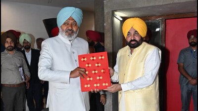 Punjab finance minister Harpal Singh Cheema (left) with chief minister Bhagwant Singh Mann before presenting the state budget for 2025-26 at the assembly in Chandigarh on Wednesday. (Ravi Kumar/HT) Punjab finance minister Harpal Singh Cheema (left) with chief minister Bhagwant Singh Mann before presenting the state budget for 2025-26 at the assembly in Chandigarh on Wednesday. (Ravi Kumar/HT)