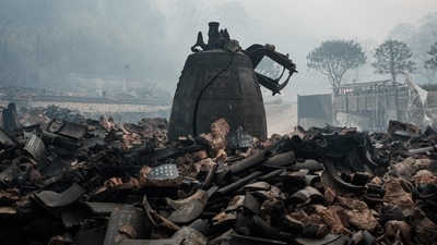 As firemen fought to stop the flames from spreading further, officials in a number of southeastern cities and towns, including Andong, Uiseong, Sancheong, and Ulsan, issued evacuation orders on Tuesday. In pic: A cracked temple bell remains after most of the buildings were burned to the ground. (AFP) As firemen fought to stop the flames from spreading further, officials in a number of southeastern cities and towns, including Andong, Uiseong, Sancheong, and Ulsan, issued evacuation orders on Tuesday. In pic: A cracked temple bell remains after most of the buildings were burned to the ground. (AFP)