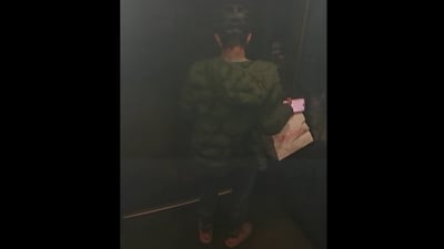 Facing away from the camera, he reportedly reached for his pants and moved to the front corner of the lift. Facing away from the camera, he reportedly reached for his pants and moved to the front corner of the lift.