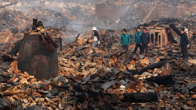 Parts of Gounsa, a Buddhist temple that was first constructed in the seventh century, have been completely destroyed by the fires. Almost half of the temple complex's thirty buildings, including two "treasures" declared by the state, were destroyed. In pic: A bell is seen broken at the remains of the bell pavilion due to wildfires at Gounsa Temple in Uiseong, South Korea. (AP) Parts of Gounsa, a Buddhist temple that was first constructed in the seventh century, have been completely destroyed by the fires. Almost half of the temple complex's thirty buildings, including two "treasures" declared by the state, were destroyed. In pic: A bell is seen broken at the remains of the bell pavilion due to wildfires at Gounsa Temple in Uiseong, South Korea. (AP)