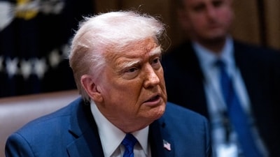 US President Donald Trump during a US ambassadors meeting in the Cabinet Room of the White House in Washington, DC, US, on Tuesday, March 25, 2025. (Bloomberg) US President Donald Trump during a US ambassadors meeting in the Cabinet Room of the White House in Washington, DC, US, on Tuesday, March 25, 2025. (Bloomberg)