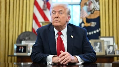 US President Donald Trump announces tariffs on auto imports in the Oval Office of the White House in Washington, DC, on March 26, 2025. Trump announced imposition of 25 percent tariffs on all cars and light trucks not built on US soil. (AFP) US President Donald Trump announces tariffs on auto imports in the Oval Office of the White House in Washington, DC, on March 26, 2025. Trump announced imposition of 25 percent tariffs on all cars and light trucks not built on US soil. (AFP)