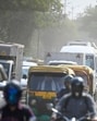 A spot check by HT on Thursday morning found the stretch from Panchsheel Park to Chirag Delhi was enveloped in dust, as vehicles moved at a snail’s pace and pedestrians covered their faces to evade dust. (Sanchit Khanna/HT Photo)