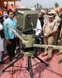 Aam Aadmi Punjab president and Punjab Cabinet minister Aman Arora, transport minister Laljit Singh Bhullar and police officials during launching of anti-drone system at village Naushera Dhalla near India- Pakistan Border on Wednesday. (Sameer Sehgal/Hindustan Times)