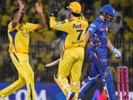 Ravichandran Ashwin celebrates a wicket with MS Dhoni in the CSK vs MI match.