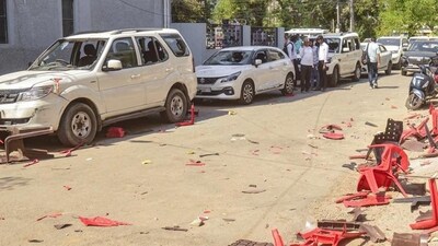 Broken chairs and damaged cars outside Samajwadi Party MP Ramji Lal Suman’s residence after it was attacked allegedly by Karni Sena workers in Agra. ((PTI Photo)) Broken chairs and damaged cars outside Samajwadi Party MP Ramji Lal Suman’s residence after it was attacked allegedly by Karni Sena workers in Agra. ((PTI Photo))