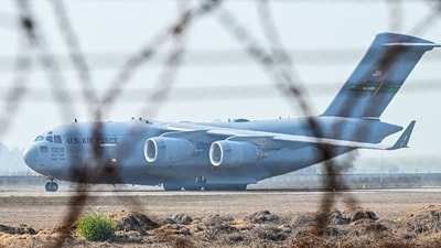 US Air Force C-17 Globemaster III aircraft carrying undocumented Indian migrants deported by the US landed at Sri Guru Ram Dass Jee International Airport in Amritsar, Punjab, India, on Feb. 5, 2025. (Bloomberg FILE) US Air Force C-17 Globemaster III aircraft carrying undocumented Indian migrants deported by the US landed at Sri Guru Ram Dass Jee International Airport in Amritsar, Punjab, India, on Feb. 5, 2025. (Bloomberg FILE)