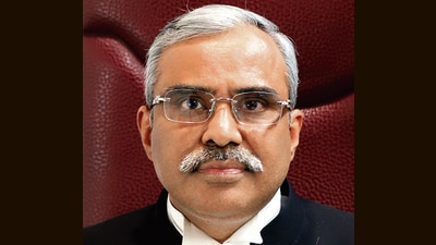 Justice Dinesh Kumar Sharma