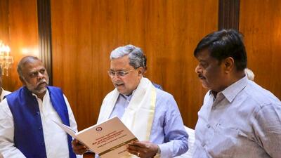 Karnataka CM Siddaramaiah receives the interim report of the committee headed by retired Justice Nagamohan Das, which was formed to provide internal reservation for Dalit communities, in Bengaluru on Thursday. (PTI) Karnataka CM Siddaramaiah receives the interim report of the committee headed by retired Justice Nagamohan Das, which was formed to provide internal reservation for Dalit communities, in Bengaluru on Thursday. (PTI)