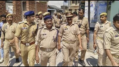 Police conduct a flag march a day after the arrest of Zafar Ali, Chairman of the Shahi Jama Masjid managing committee, in Sambhal, Monday. (PTI) Police conduct a flag march a day after the arrest of Zafar Ali, Chairman of the Shahi Jama Masjid managing committee, in Sambhal, Monday. (PTI)
