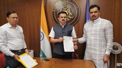 Congress MLC Rajendra Rajanna (right) with Karnataka DGP. (Facebook/Rajendra Rajanna ) Congress MLC Rajendra Rajanna (right) with Karnataka DGP. (Facebook/Rajendra Rajanna )