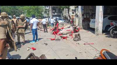 The scene outside Ramjilal Suman’s house after the Karni Sena attack in Agra on Wednesday. (HT File Photo)