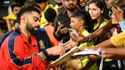 Most fans were wearing the yellow of CSK and some had the blue of India on. (RCB - X) Most fans were wearing the yellow of CSK and some had the blue of India on. (RCB - X)