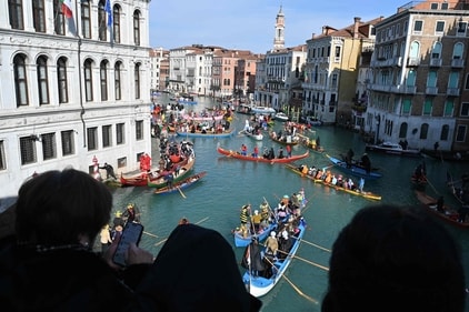 Decorated boats sail on the Grand Canal during the Venice Carnival on February 16, 2025. This year, the theme of one of the most famous carnivals in the world is Casanova, as the 'Serenissima' celebrates the 300th anniversary of the famous man's birth. (AFP) Decorated boats sail on the Grand Canal during the Venice Carnival on February 16, 2025. This year, the theme of one of the most famous carnivals in the world is Casanova, as the 'Serenissima' celebrates the 300th anniversary of the famous man's birth. (AFP)