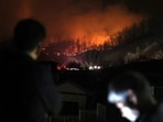 A wildfire spreads on a mountain in Sancheong, South Korea, Thursday, March 27, 2025. AP/PTI A wildfire spreads on a mountain in Sancheong, South Korea, Thursday, March 27, 2025. AP/PTI
