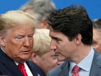 US President Donald Trump talks with Canada's former Prime Minister Justin Trudeau.