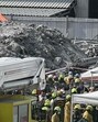 Rescue workers near the debris of a construction site in Bangkok following powerful earthquakes in Myanmar and Thailand on Friday. (AFP)