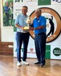 Sandeep Sandhu (left) being presented with the AV Thomas rolling trophy by former member of the International Golf Federation Olympic Golf Committee Dilip Thomas. (HT Photo)