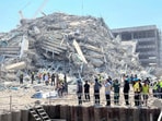 Rescuers work at the site of a collapsed building after the tremors of a strong earthquake that struck central Myanmar on Friday affected Bangkok, Thailand, March 28, 2025. 