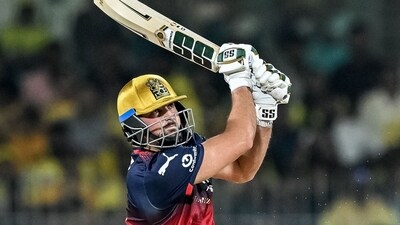 RCB were given quite a sensational late boost by Tim David. The Australian smashed 22 runs in eight balls to take RCB to a score of 196/7 batting first.  (AFP)