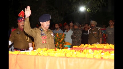 Director General of Police (DGP) Nalin Prabhat pays tribute to the mortal remains of three Jammu and Kashmir policemen Balwinder Singh Chib, Jaswant Singh, and Tariq Ahmed during a wreath laying ceremony at district police lines, in Kathua, Jammu and Kashmir, on Friday. (PTI)