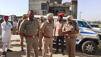 Police at the crime spot at Kanianwali village in Faridkot on Friday morning. (HT Photo)