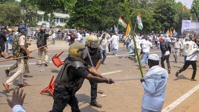Police personnel lathi-charge Congress protesters near the Odisha assembly in Bhubaneswar. (PTI Photo) Police personnel lathi-charge Congress protesters near the Odisha assembly in Bhubaneswar. (PTI Photo)