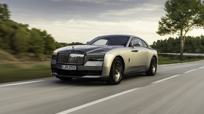 The Rolls-Royce Black Badge Spectre is a high-performance iteration of the luxury Spectre EV. It comes sporting a bold exterior, a posh interior and multiple customisation options for the rich to make the car truly one of a kind. The Black Badge Spectre is aimed primarily at international markets. The Rolls-Royce Black Badge Spectre is a high-performance iteration of the luxury Spectre EV. It comes sporting a bold exterior, a posh interior and multiple customisation options for the rich to make the car truly one of a kind. The Black Badge Spectre is aimed primarily at international markets.