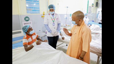 UP chief minister Yogi Adityanath meets children affected by food poisoning, at Lok Bandhu Raj Narayan Combined Hospital in Lucknow on Friday. (Sourced) UP chief minister Yogi Adityanath meets children affected by food poisoning, at Lok Bandhu Raj Narayan Combined Hospital in Lucknow on Friday. (Sourced)