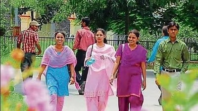 Women students on a varsity campus in Prayagraj Women students on a varsity campus in Prayagraj