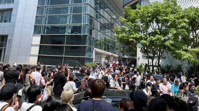 People gather on the street, after the tremors from a strong earthquake that struck central Myanmar on Friday hit Bangkok, Thailand on March 28, 2025. (Reuters)