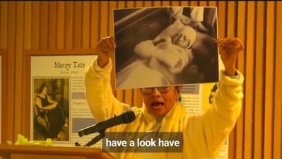 Mamata Banerjee pulled out a poster-sized image of herself from the 1990s during a speech at Oxford University's Kellogg College. (X (TMC)) Mamata Banerjee pulled out a poster-sized image of herself from the 1990s during a speech at Oxford University's Kellogg College. (X (TMC))