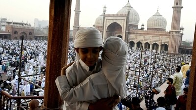 Children rejoice in the holy moment and exchange Eid greetings after offering Namaz. They were seen hugging and celebrating with Jama Masjid in the backdrop, in Delhi. (Sanjeev Verma/HT Photo) Children rejoice in the holy moment and exchange Eid greetings after offering Namaz. They were seen hugging and celebrating with Jama Masjid in the backdrop, in Delhi. (Sanjeev Verma/HT Photo)