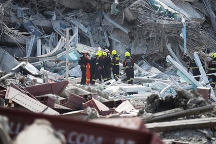 Rescuers work at the site of a high-rise building under construction that collapsed after a 7.7 magnitude earthquake in Bangkok on March 28. (AP) Rescuers work at the site of a high-rise building under construction that collapsed after a 7.7 magnitude earthquake in Bangkok on March 28. (AP)