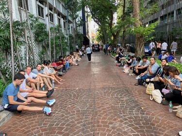 People wait to be told it is safe to go back inside the Sathorn Gardens condominium building after an earthquake in Bangkok, Friday, March 28, 2025. (AP Photo/Brian P. D. Hannon) (AP) People wait to be told it is safe to go back inside the Sathorn Gardens condominium building after an earthquake in Bangkok, Friday, March 28, 2025. (AP Photo/Brian P. D. Hannon) (AP)