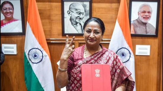 Delhi chief minister Rekha Gupta with the budget document at her office on Tuesday. (ANI Photo)