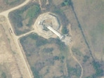 This satellite photo from Planet Labs PBC shows a collapse air traffic control tower at the Naypyitaw International Airport after an earthquake struck in Naypyitaw, Myanmar, Saturday,