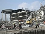Rescuers dug through the rubble of collapsed buildings on March 29 in a desperate search for survivors after a huge earthquake hit Myanmar and Thailand.