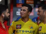 Vansh Bedi (c) with Virat Kohli (L) and MS Dhoni Vansh Bedi (c) with Virat Kohli (L) and MS Dhoni