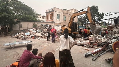 Volunteers work at an earthquake affected area in Mandalay, central Myanmar. (AP) Volunteers work at an earthquake affected area in Mandalay, central Myanmar. (AP)
