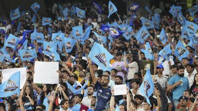 Gujarat Titans fans cheer for their team during the Indian Premier League. (AP)