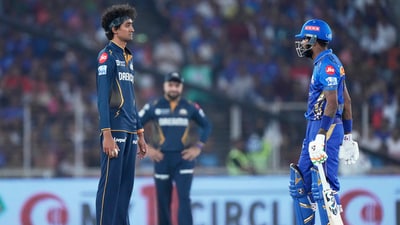 Mumbai Indians' captain Hardik Pandya, right, and Gujarat Titans' Sai Kishore exchanged words in a heated moment. (AP) Mumbai Indians' captain Hardik Pandya, right, and Gujarat Titans' Sai Kishore exchanged words in a heated moment. (AP)