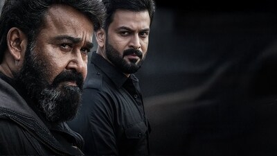 L2 Empuraan worldwide box office collection day 1: Mohanlal and Prithviraj Sukumaran in a still from the film. L2 Empuraan worldwide box office collection day 1: Mohanlal and Prithviraj Sukumaran in a still from the film.