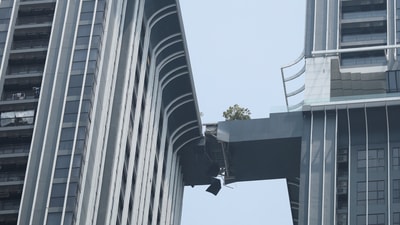 A bridge that connects two high-rise condominiums is seen damaged, following a strong earthquake, in Bangkok, Thailand. (REUTERS)