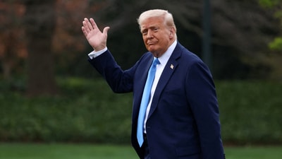 US President Donald Trump waves as he walks before departing for Florida from the South Lawn at the White House in Washington, D.C., U.S., March 28, 2025. (REUTERS)
