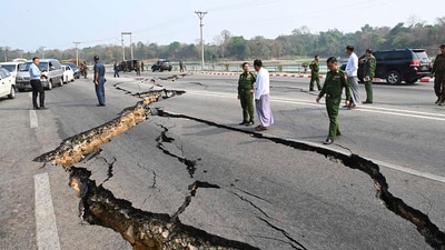 In this image provided by The Myanmar Military True News Information Team, Myanmar's military leader Senior Gen. Min Aung Hlaing, center, inspects damaged road caused by an earthquake Friday, in Naypyitaw. (AP) In this image provided by The Myanmar Military True News Information Team, Myanmar's military leader Senior Gen. Min Aung Hlaing, center, inspects damaged road caused by an earthquake Friday, in Naypyitaw. (AP)