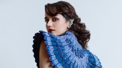 The actor looks breathtaking in a Nature-inspired ensemble featuring a drape gown with peacock feather motifs, adorned with sequins, and enhanded with structured shoulders, and cut out details at the waist. Her look is further elevated by Zambian emerald cascade diamond ear cuffs and statement diamond earrings. The actor looks breathtaking in a Nature-inspired ensemble featuring a drape gown with peacock feather motifs, adorned with sequins, and enhanded with structured shoulders, and cut out details at the waist. Her look is further elevated by Zambian emerald cascade diamond ear cuffs and statement diamond earrings.