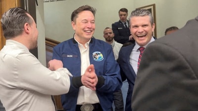 Elon Musk and US Defence Secretary Pete Hegseth laugh at the Pentagon in Washington, DC, on March 21. (REUTERS)