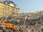 Rescuers work at the Sky Villa Condo that collapsed In Friday's earthquake in Mandalay. Rescuers work at the Sky Villa Condo that collapsed In Friday's earthquake in Mandalay.